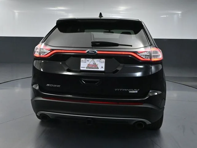 Used 2016 Black Ford Titanium image 4