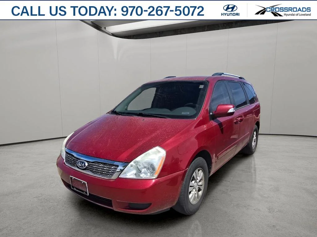 Used 2012 Claret Red Kia LX image 1