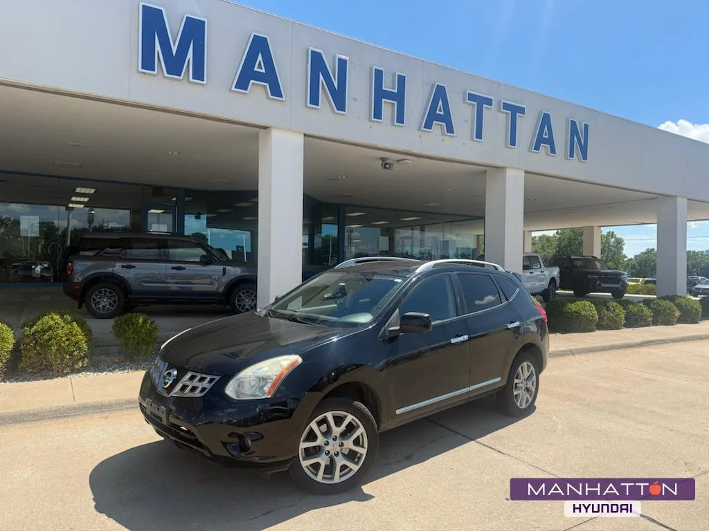 Used 2012 Super Black Nissan SL image 1