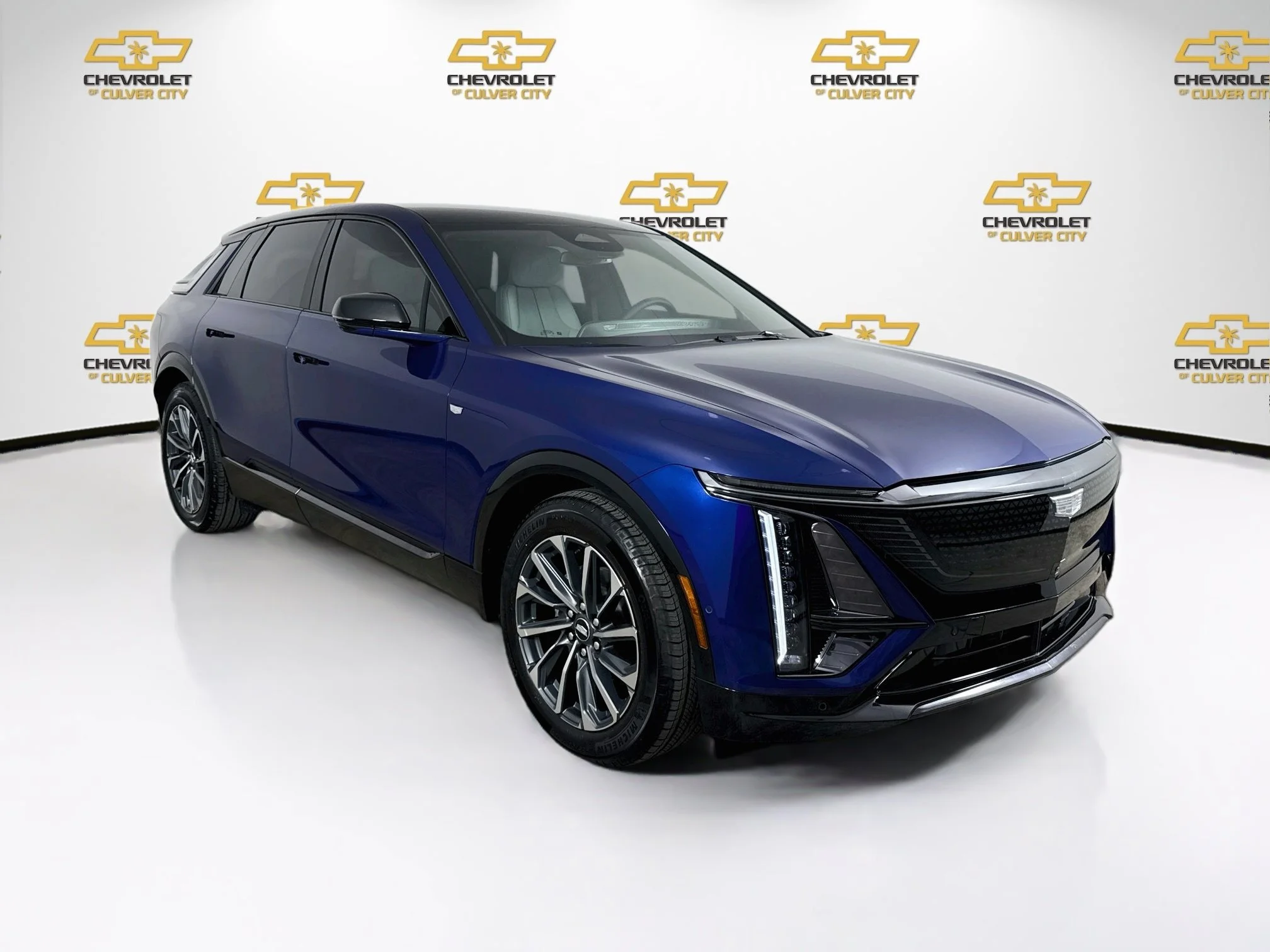 Used 2025 Opulent Blue Metallic Cadillac Sport 1 image 1