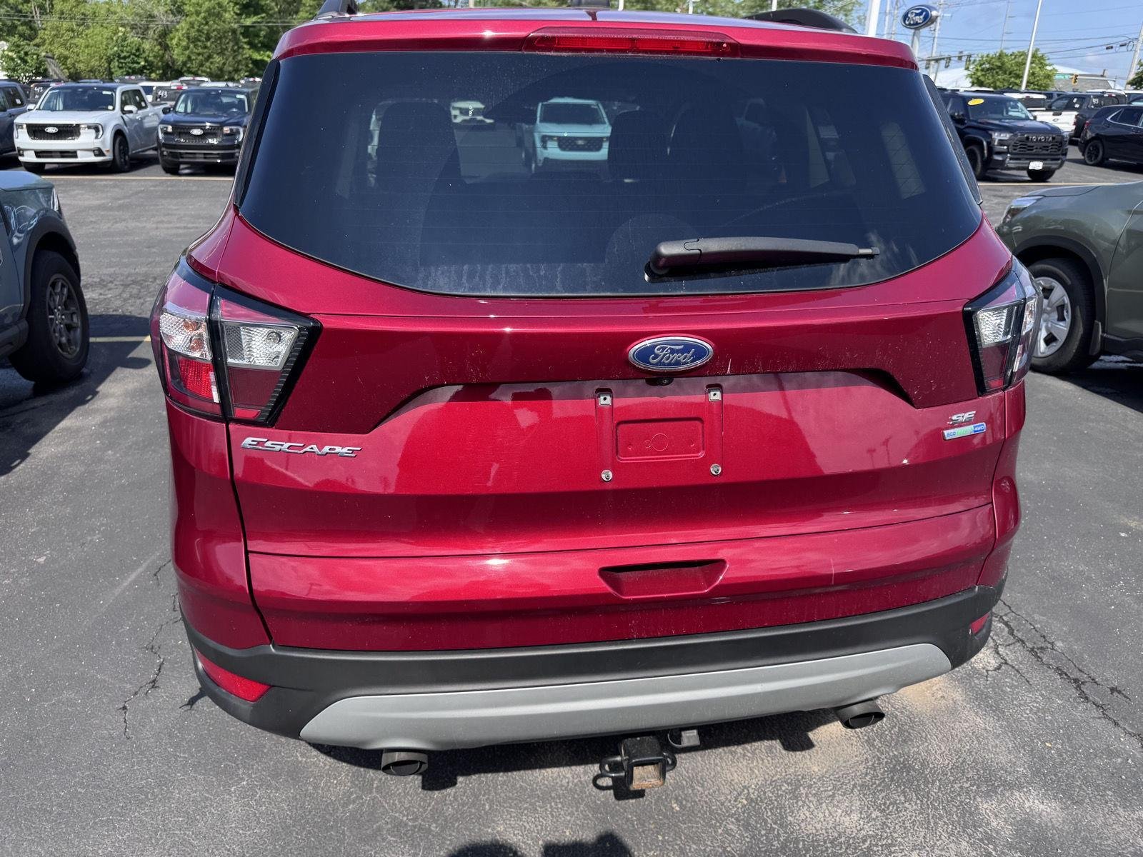 Used 2018 Ruby Red Metallic Tinted Clearcoat Ford SE image 5