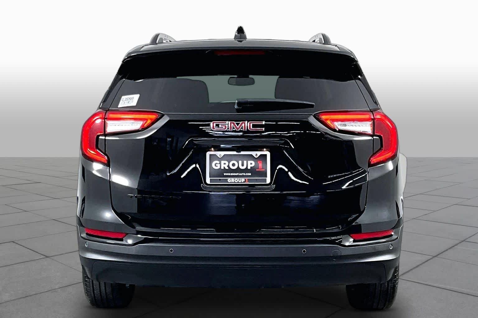 Used 2024 Ebony Twilight Metallic GMC SLE image 5
