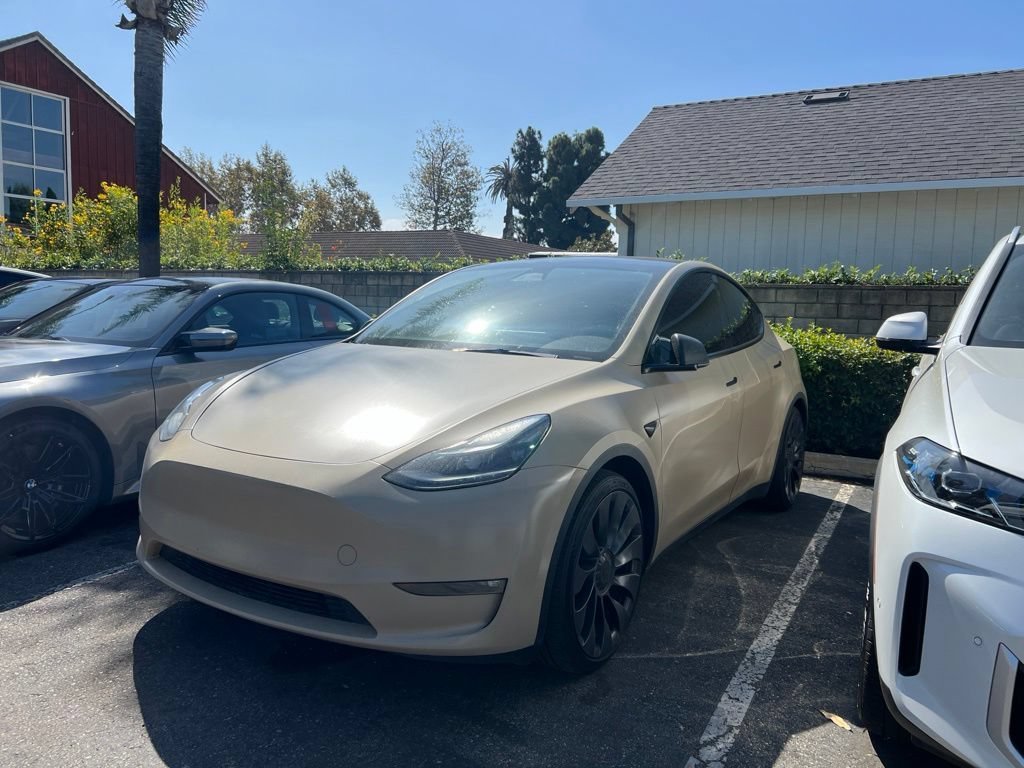 Used 2023 Solid Black Tesla Performance image 2