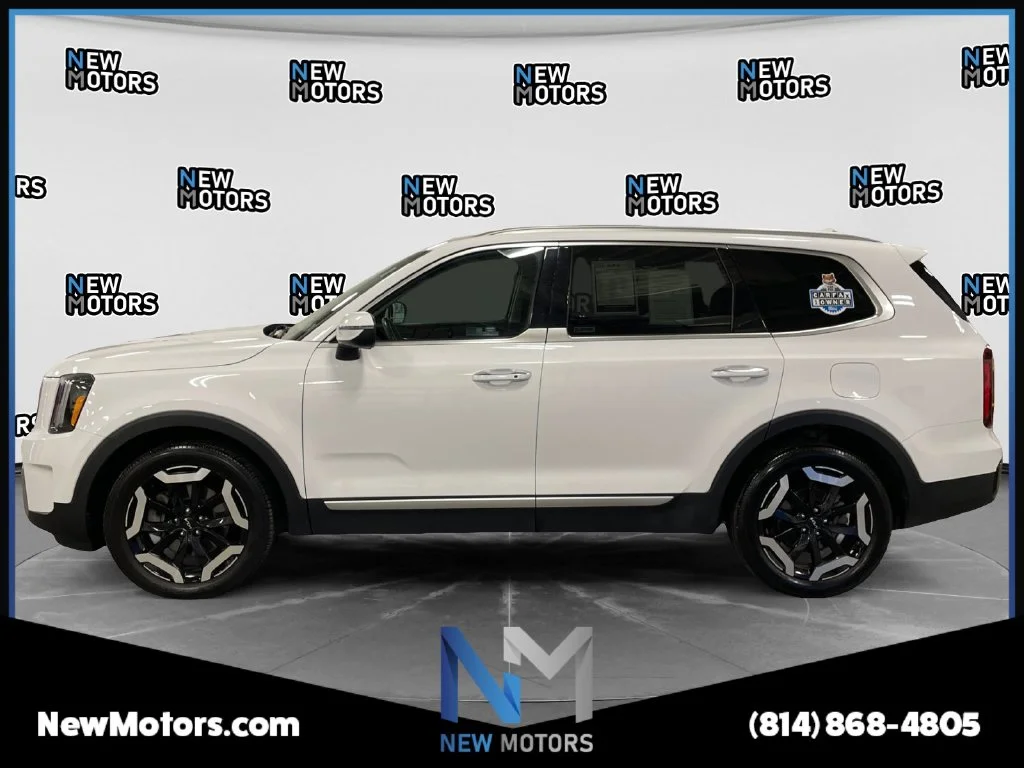 Used 2023 White Pearl Kia S image 2