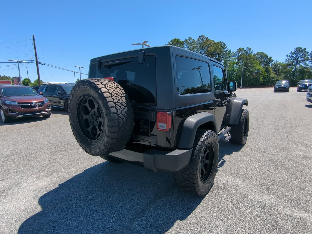 Used 2017 Black Jeep Willys Wheeler image 4