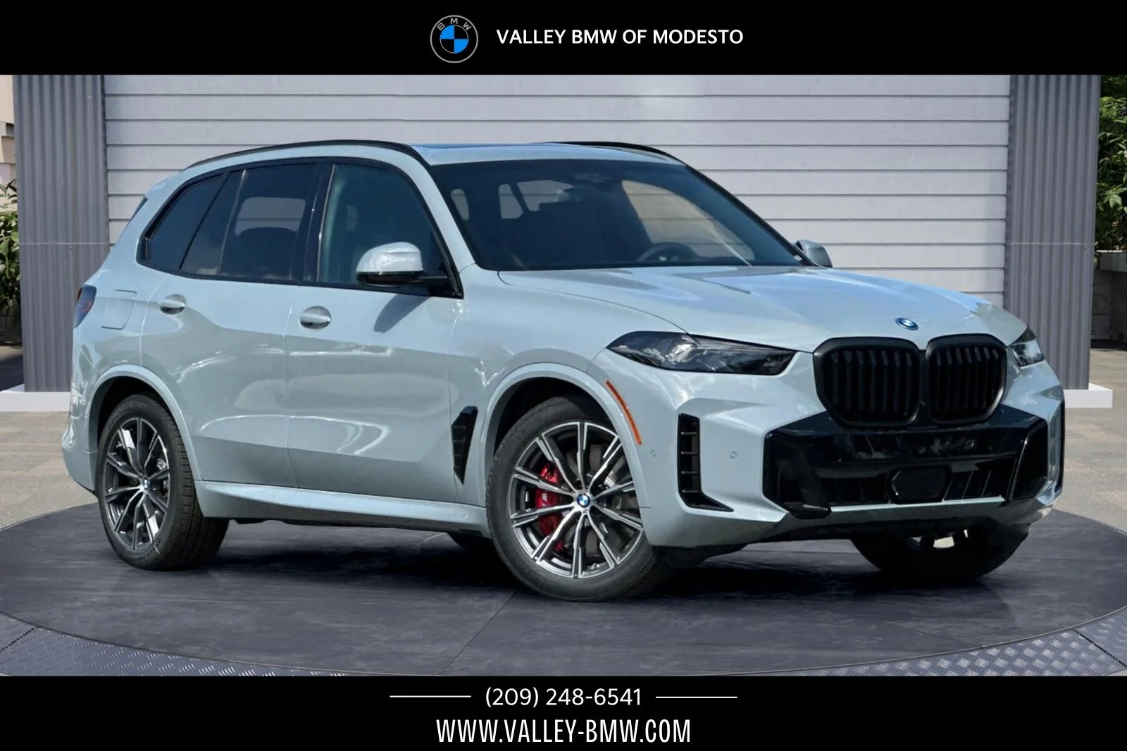 New 2026 Brooklyn Grey Metallic BMW xDrive50e image 1