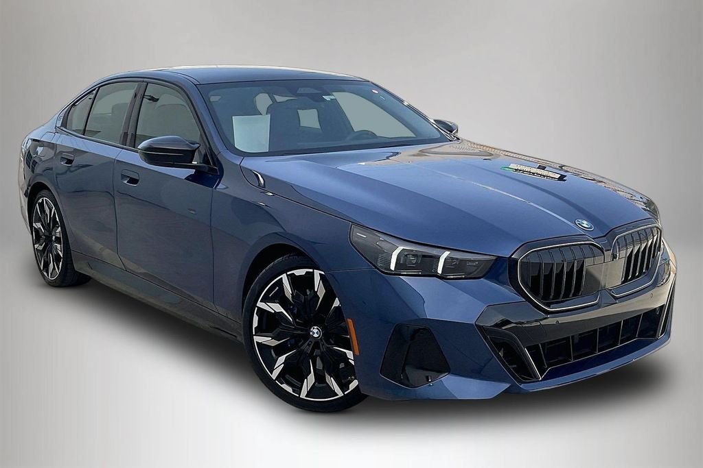 Used 2026 Blue BMW 550e xDrive image 1