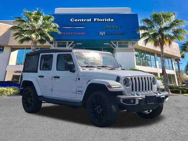 Certified 2022 Jeep Wrangler Unlimited Sahara 4XE with VIN 1C4JJXP67NW218929 for sale in Orlando, FL