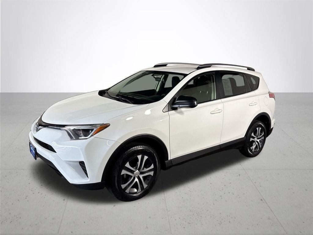 Used 2016 Super White Toyota LE image 2