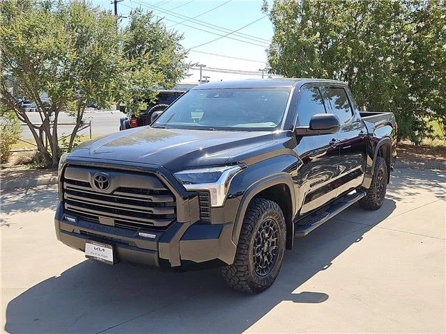 Used 2025 Midnight Black Metallic Toyota SR5 (A10) 4x4 CrewMax 5.5 ft. box 145.7 in. WB image 1