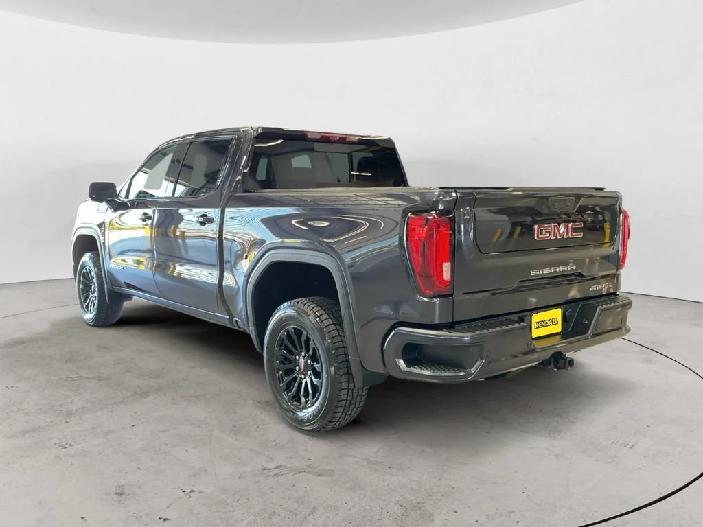 Used 2023 Titanium Rush Metallic GMC AT4X image 7