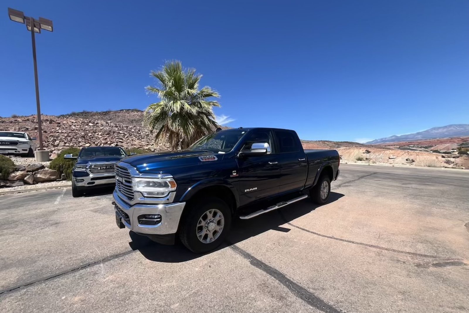 Used 2021 Patriot Blue Pearlcoat Ram Laramie image 1