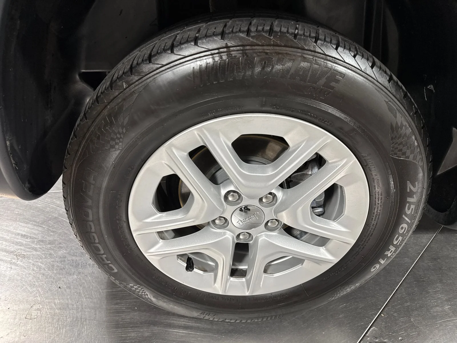 Used 2018 Granite Crystal Metallic Clearcoat Jeep Sport image 12