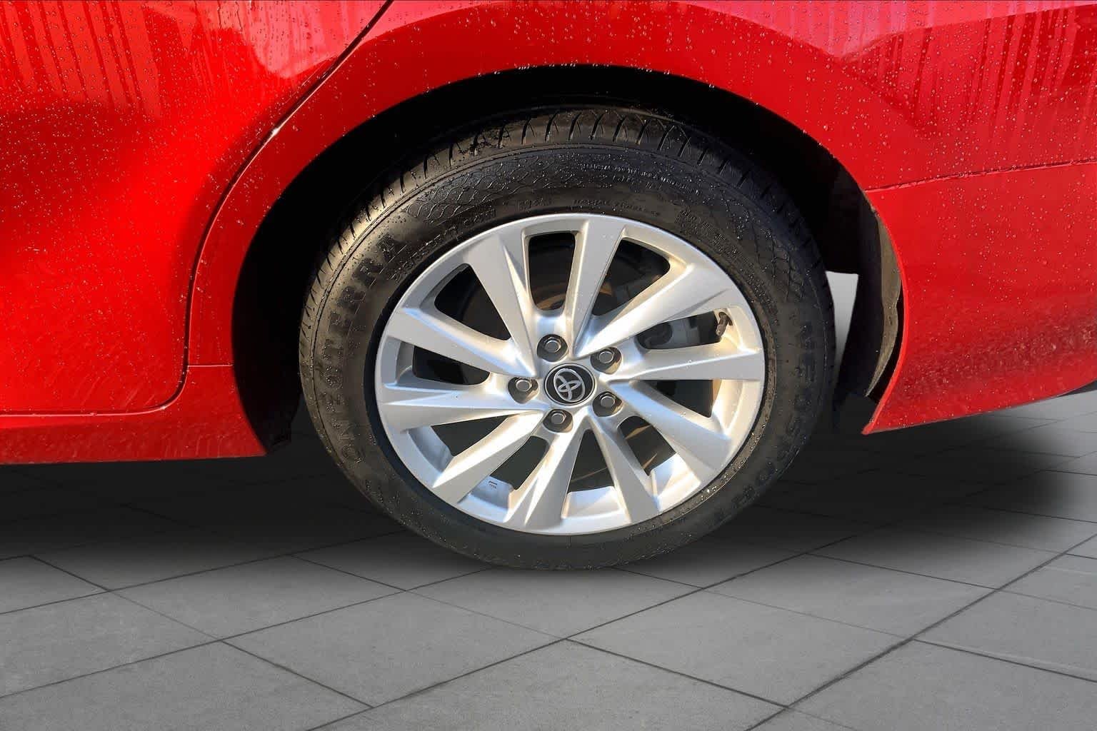 Used 2024 Supersonic Red Toyota LE image 10