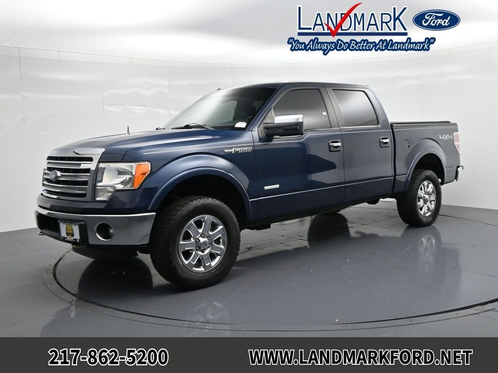 Used 2013 Blue Ford Lariat image 1
