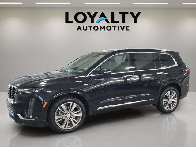 Used 2024 Stellar Black Metallic Cadillac Premium Luxury image 1
