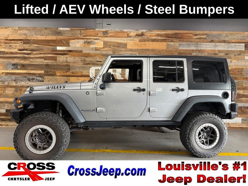 Used 2016 Billet Silver Metallic Jeep Unlimited Sport image 1