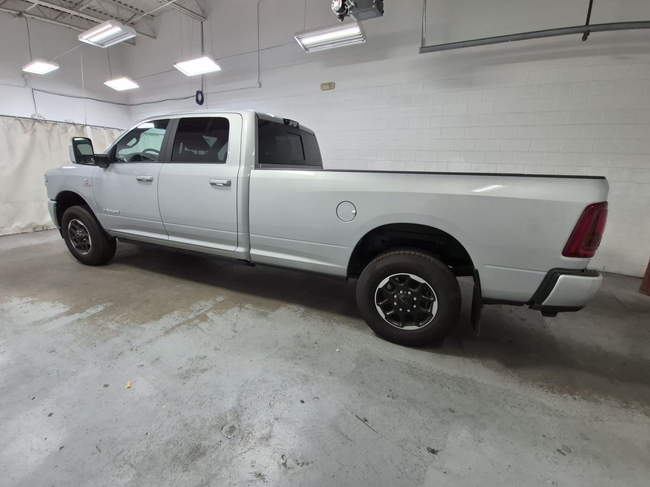 New 2026 Silver-Zynith Exterior Paint RAM Laramie image 8