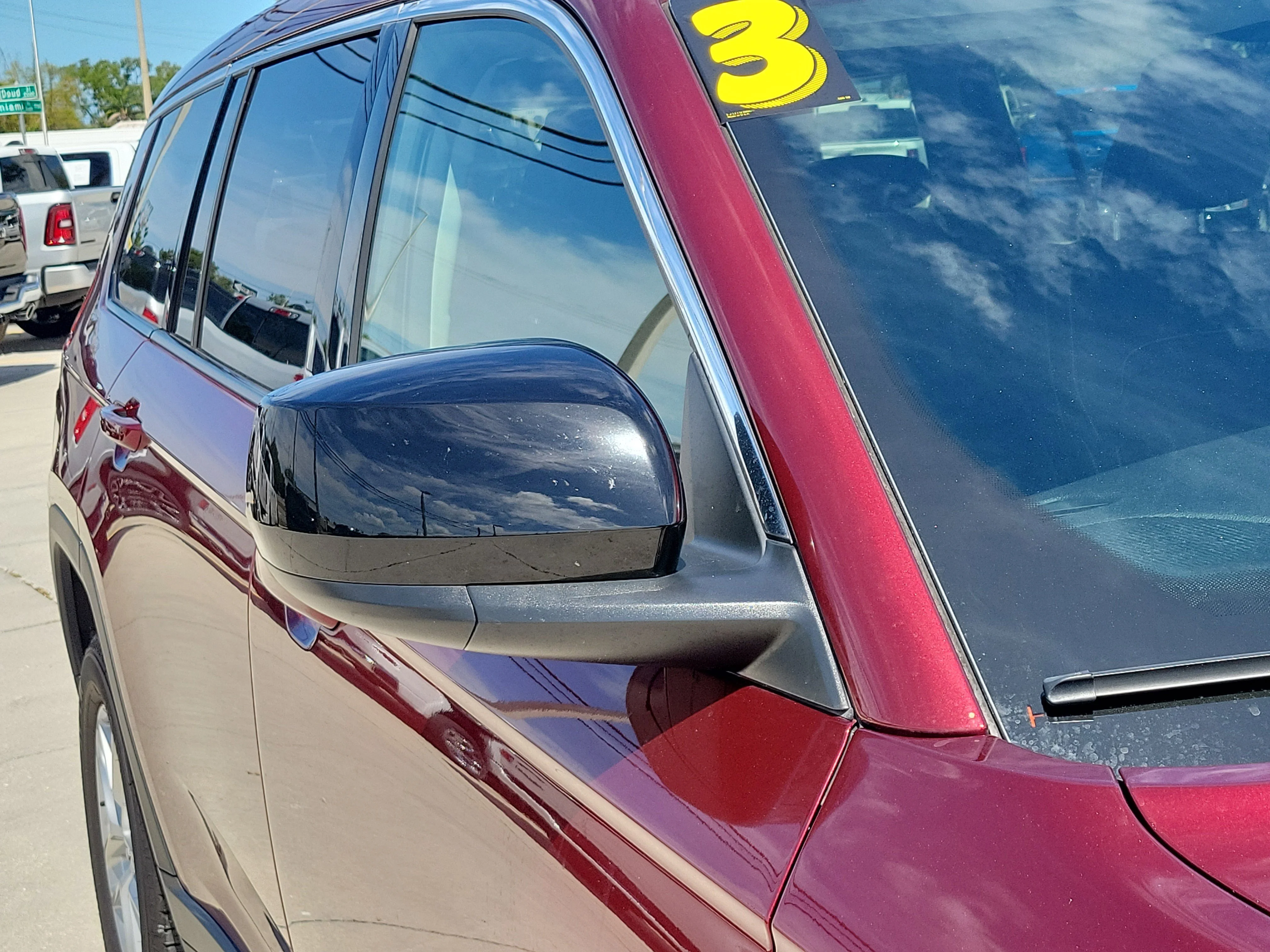 Used 2023 Velvet Red Pearlcoat Jeep Laredo image 9
