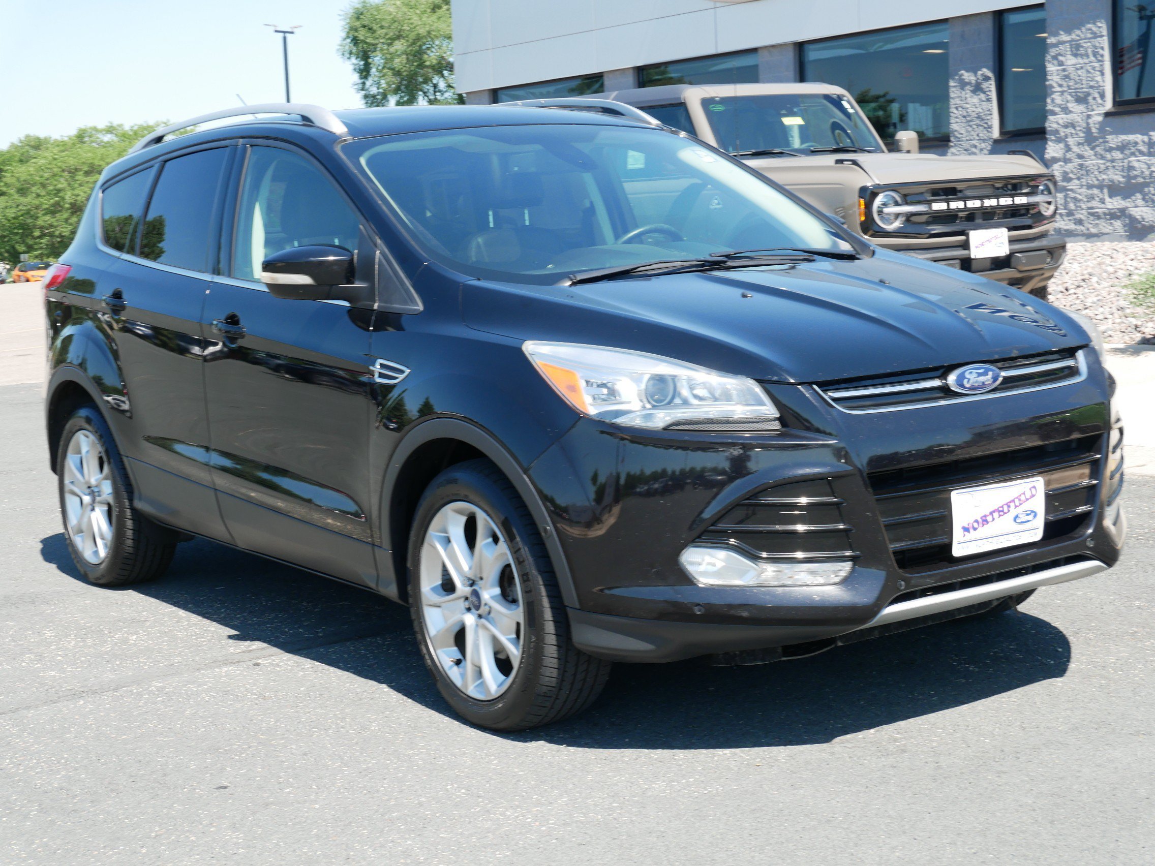 Used 2016 Ford Escape Titanium with VIN 1FMCU9JX2GUC24211 for sale in Northfield, Minnesota