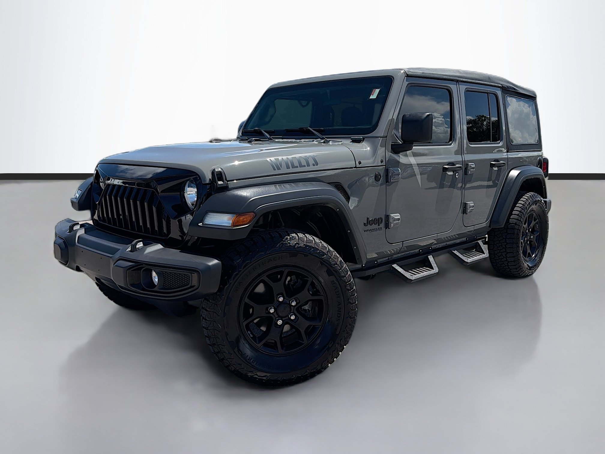 Used 2021 Sting-Gray Clearcoat Jeep Unlimited Willys Sport image 1