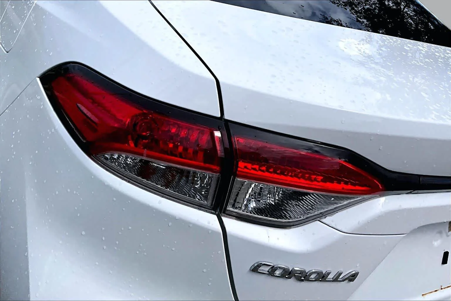 Used 2021 Super White Toyota LE image 29