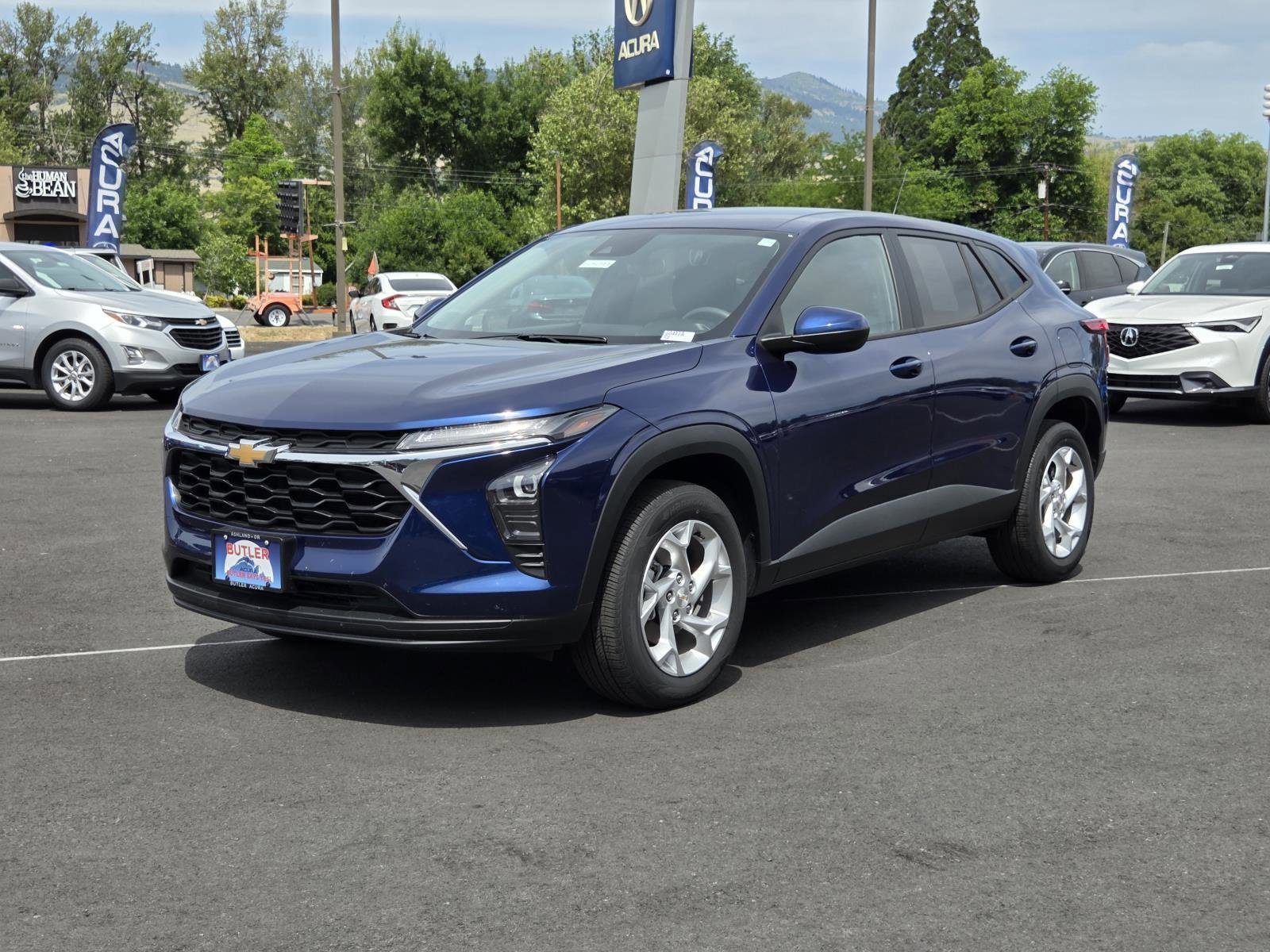 Used 2024 Blue Glow Metallic Chevrolet LS image 1