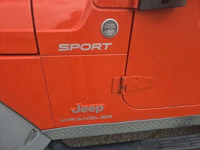 Used 2005 Impact Orange Cle Jeep Sport image 25