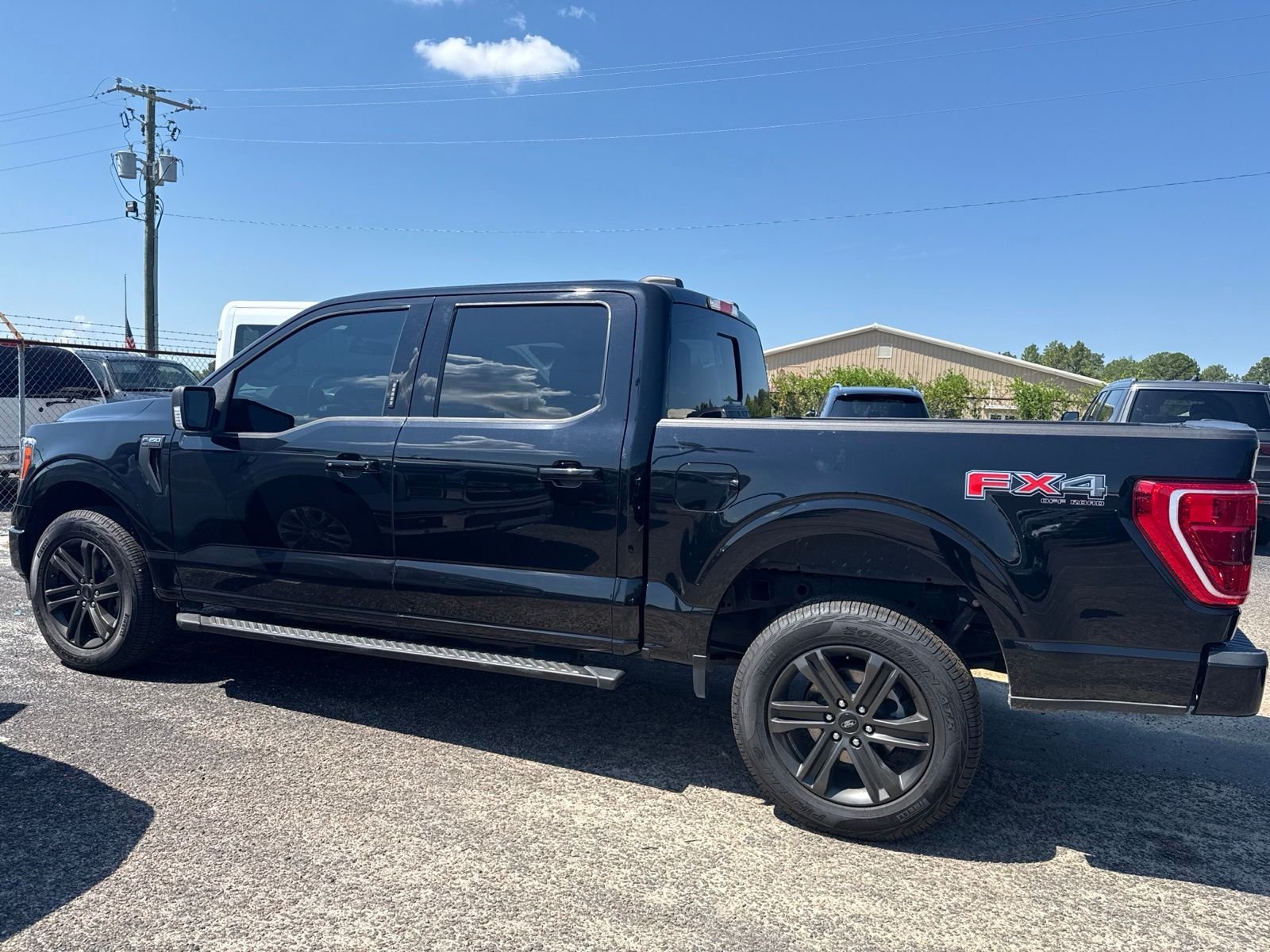 Used 2021 Agate Black Metallic Ford XLT image 4