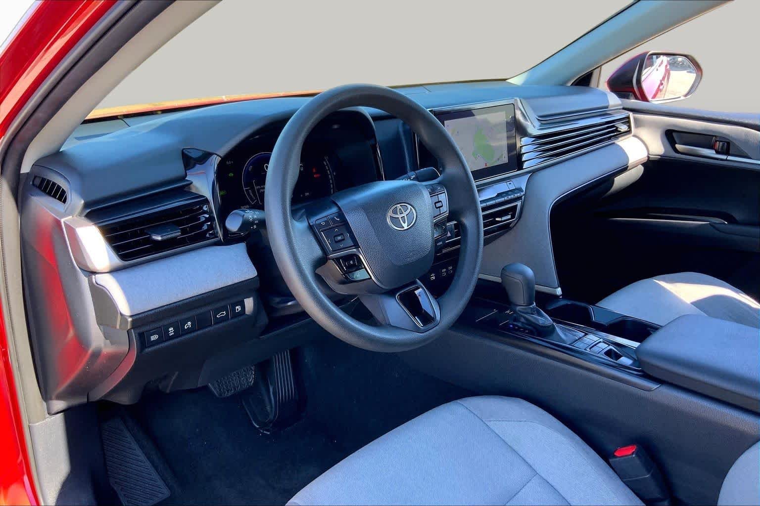 Used 2025 Supersonic Red Toyota LE image 17