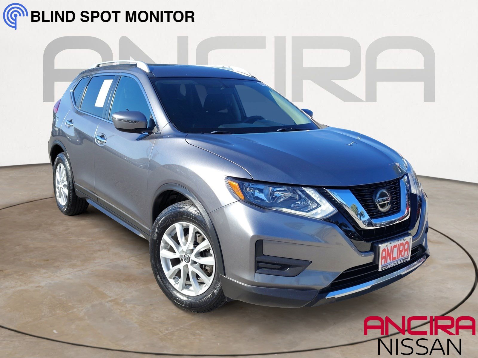 Used 2018 Gun Metallic Nissan SV image 1