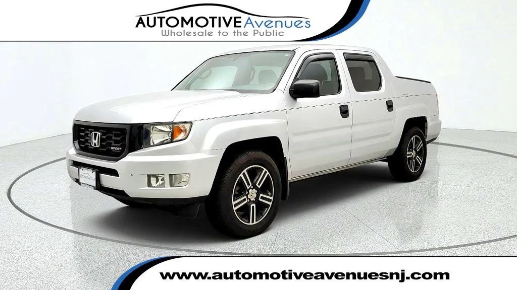 Used 2013 Alabaster Silver Metallic Honda 4WD Crew Cab Sport image 1