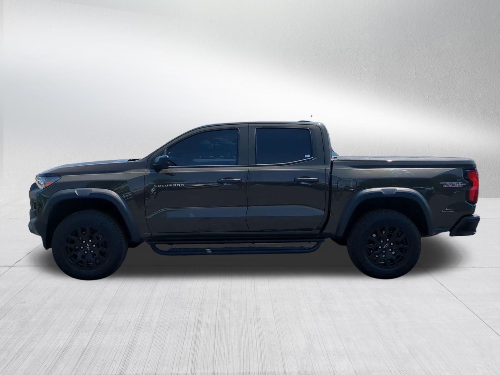 Certified Used 2023 HARVEST BRONZE METALLIC Chevrolet 4WD Trail Boss image 2