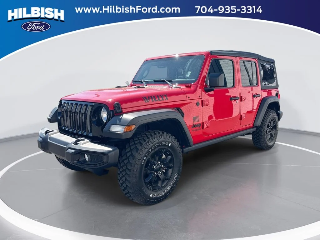 Used 2021 Red Jeep Unlimited Willys image 1