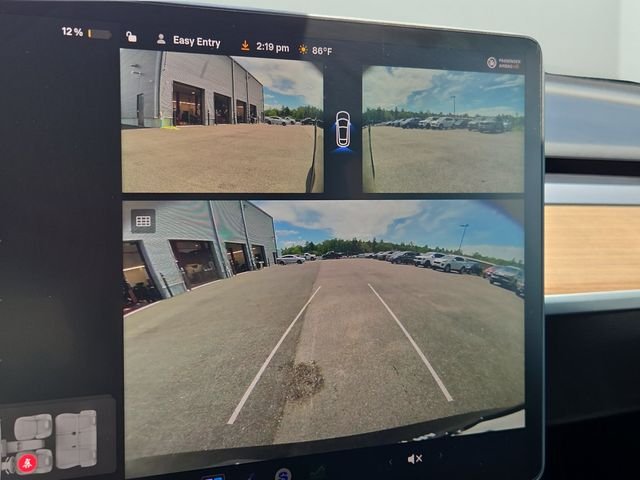 Used 2024 Solid Black Tesla Long Range image 9