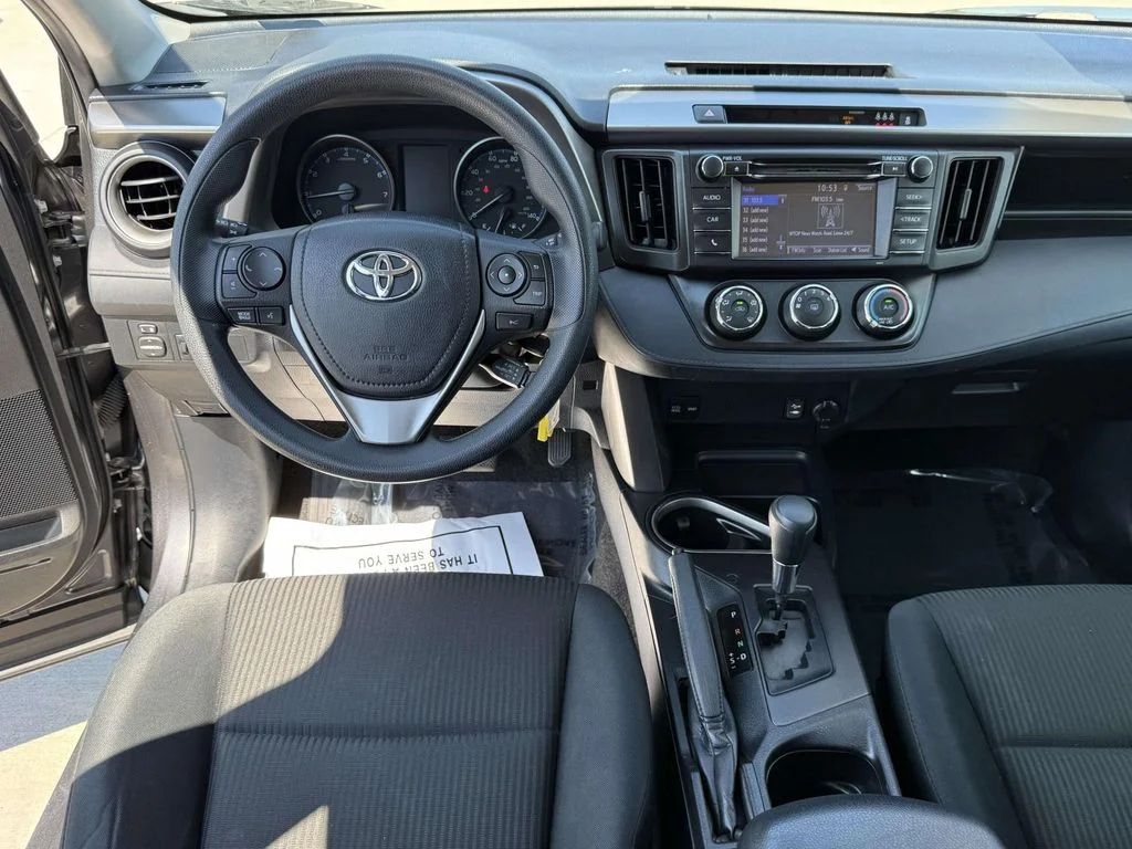Used 2018 Magnetic Gray Metallic Toyota LE image 16