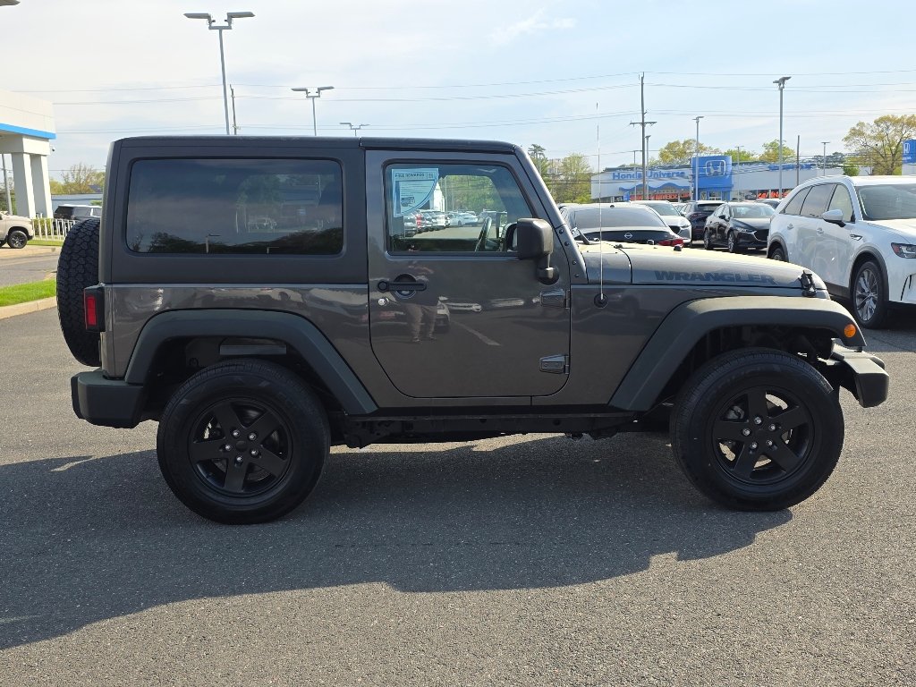 Used 2016 Granite Crystal Metallic Clear Coat Jeep Sport image 18
