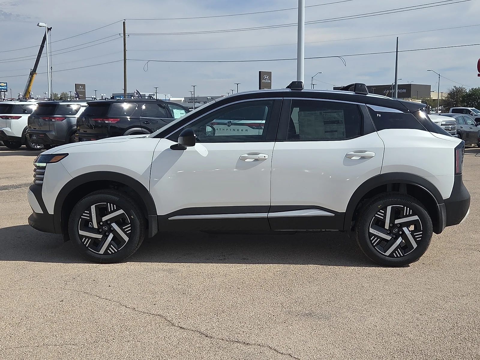 New 2026 XAB 2T White Black Nissan SV Front-Wheel Drive image 2