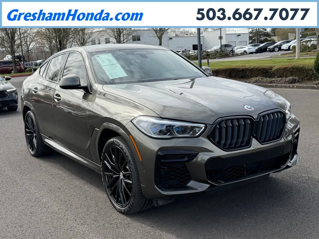 Used 2022 Manhattan Green Metallic BMW M50i image 1