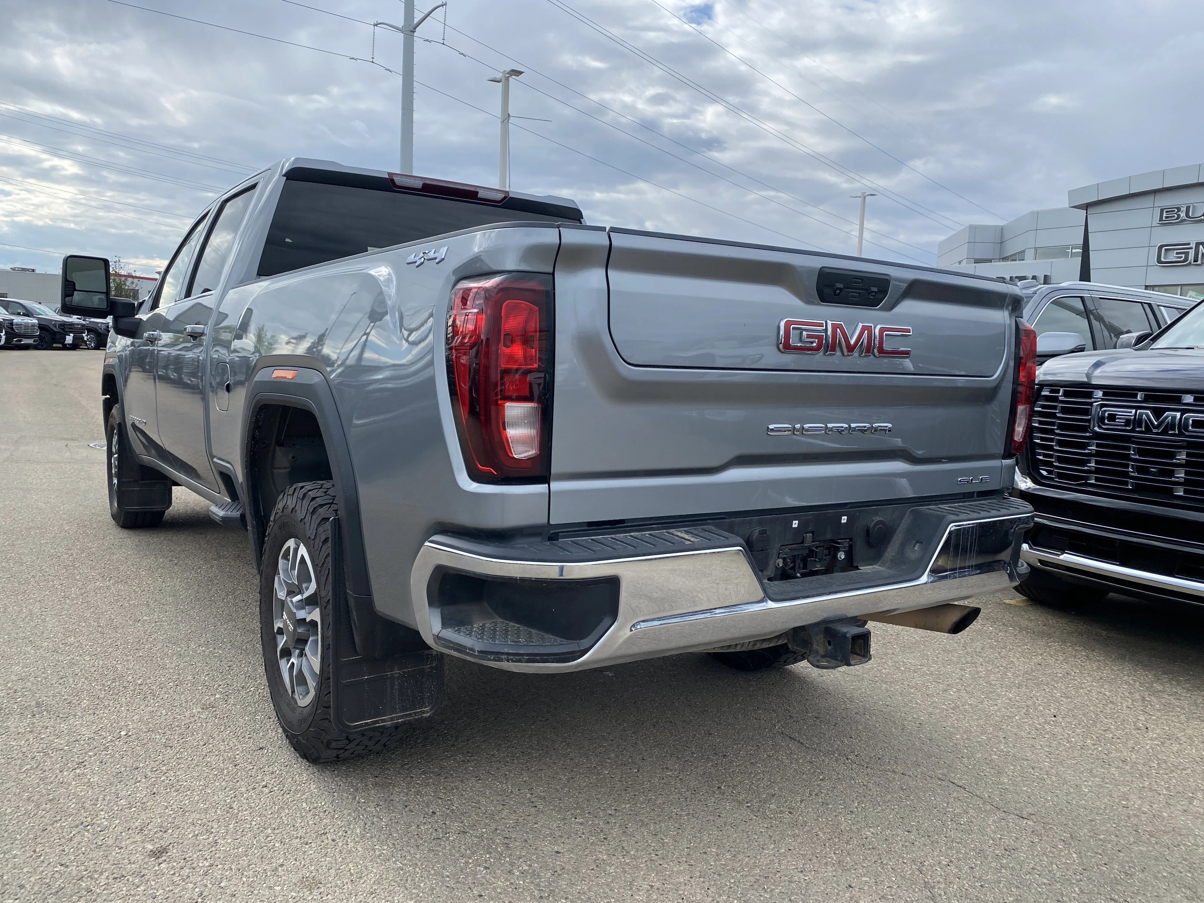 Certified Used 2024 Silver GMC Crew Cab SLE image 3