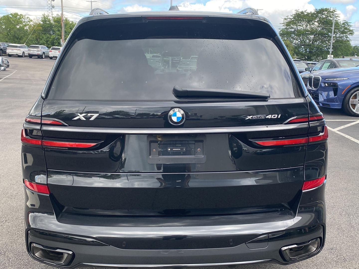 Certified Used 2024 Black Sapphire Metallic BMW xDrive40i image 3