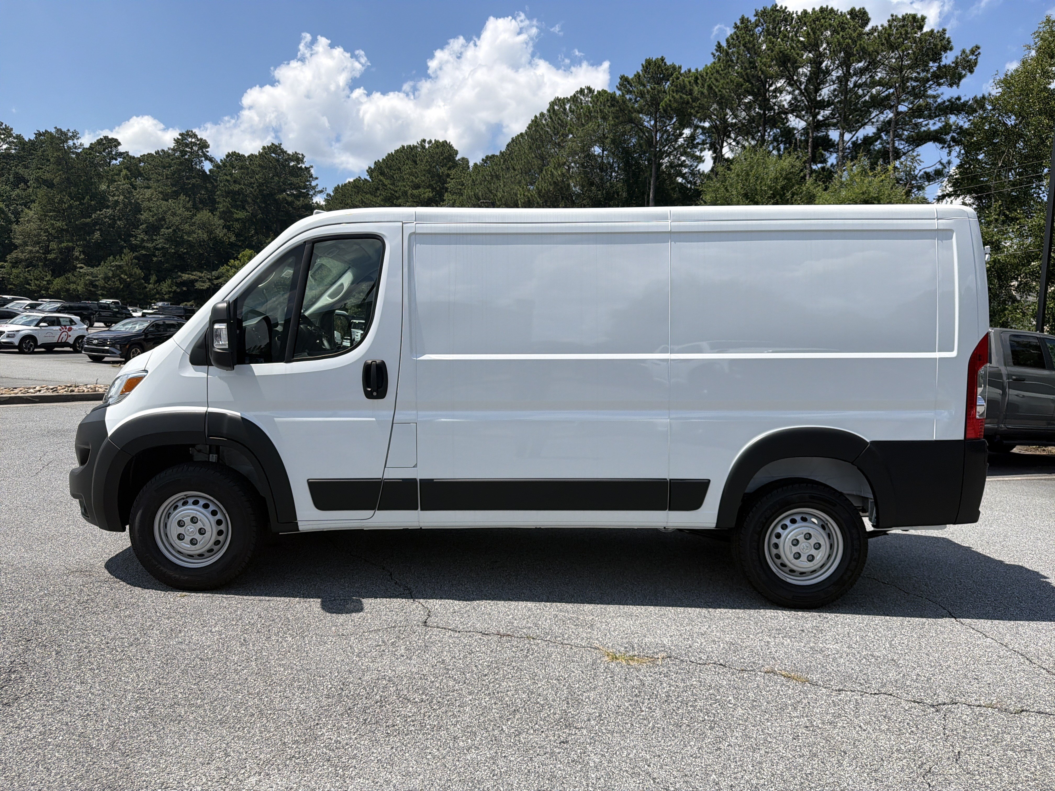New 2026 Bright White Clearcoat RAM Low Roof image 4