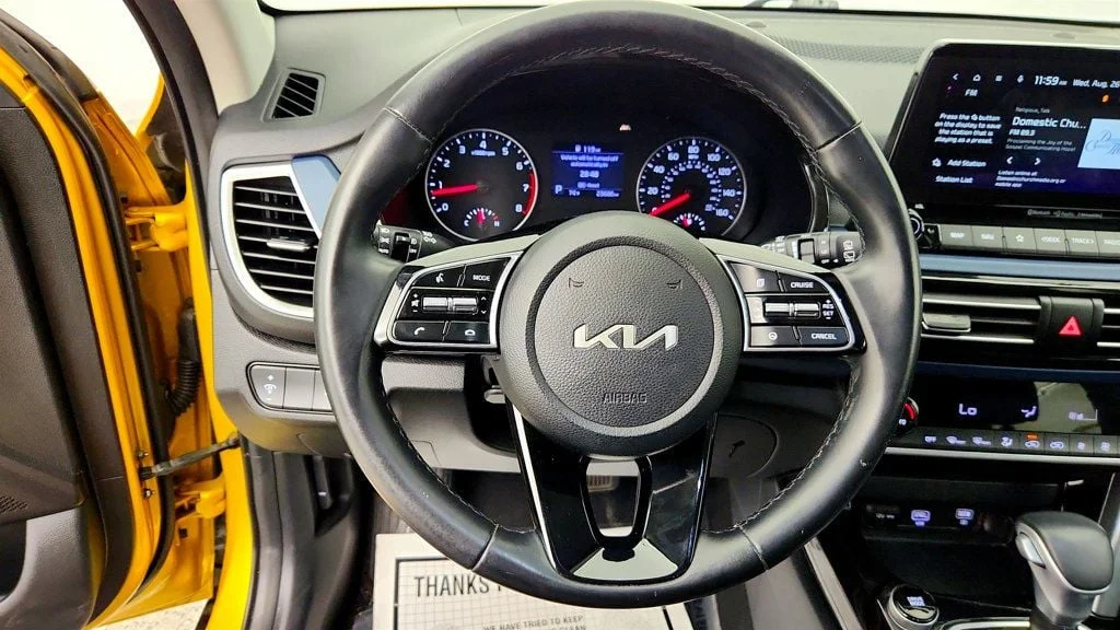 Used 2023 Starbright Yellow/Black Roof Kia S IVT AWD w/ Navigation Pkg & Illuminated Sills image 12