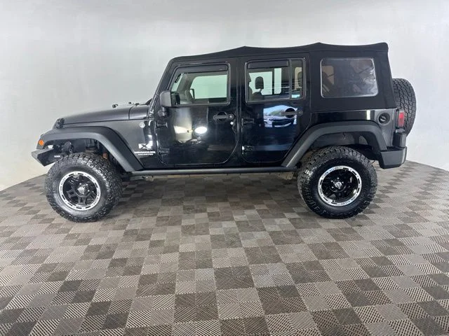 Used 2009 Black Jeep Unlimited X image 10