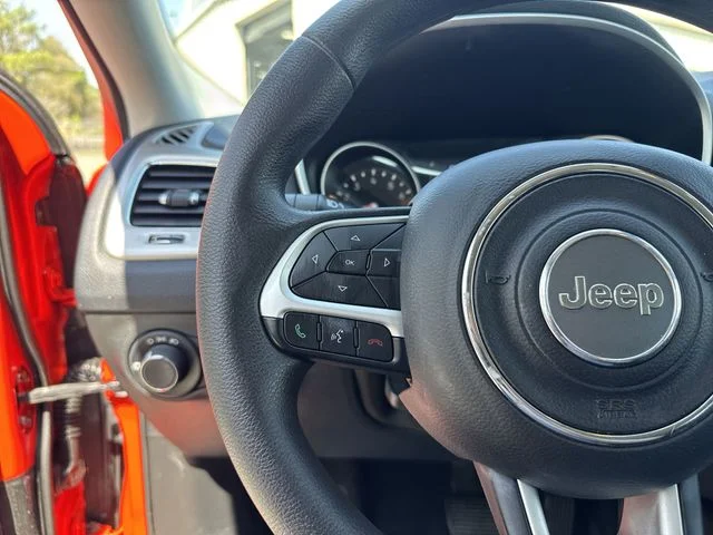 Used 2019 Orange Jeep Sport image 16