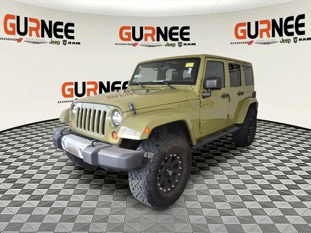 Used 2013 Green Jeep Unlimited Sahara image 6