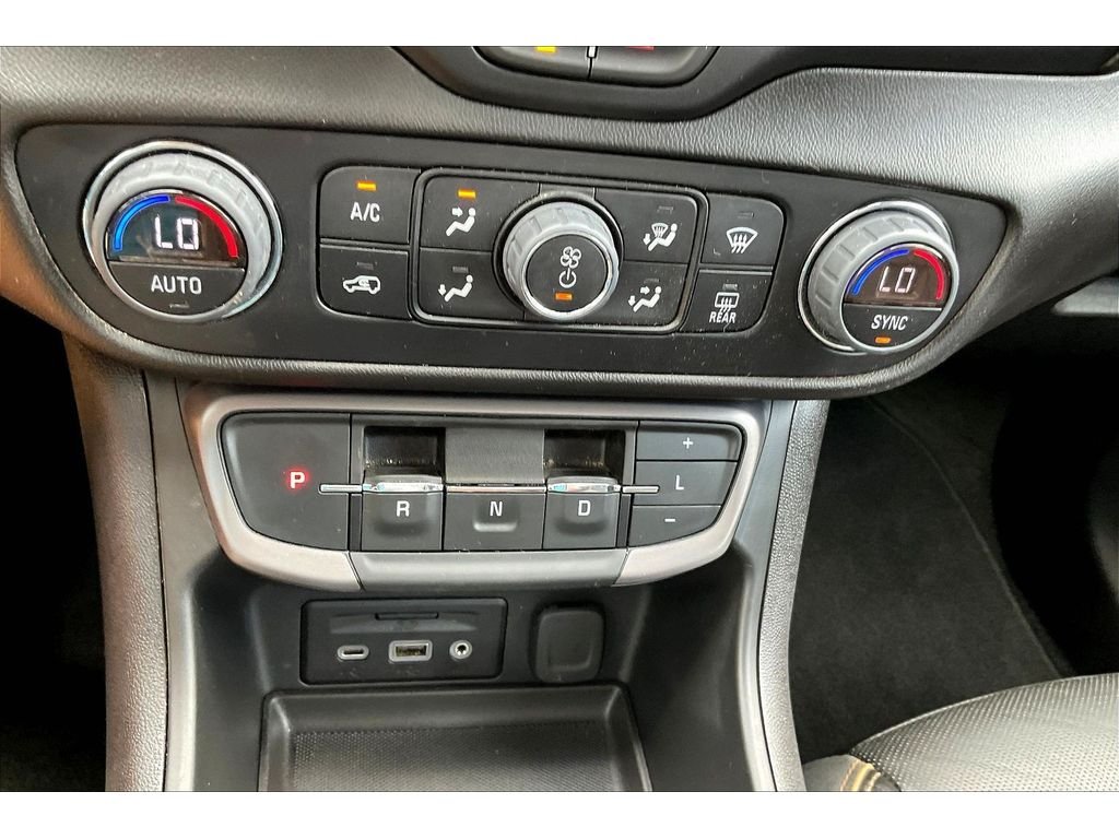 Used 2024 Ebony Twilight Metallic GMC AT4 image 21