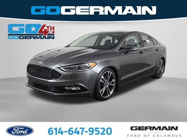 Certified Used 2017 Magnetic Ford Titanium image 1