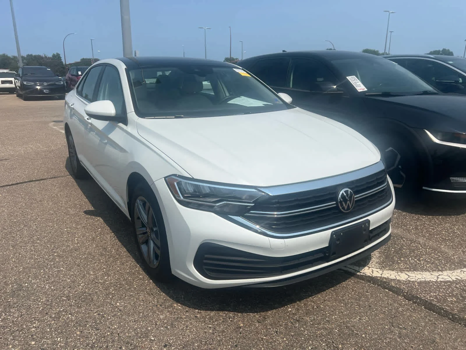 Used 2023 Opal White Pearl Volkswagen SE image 2
