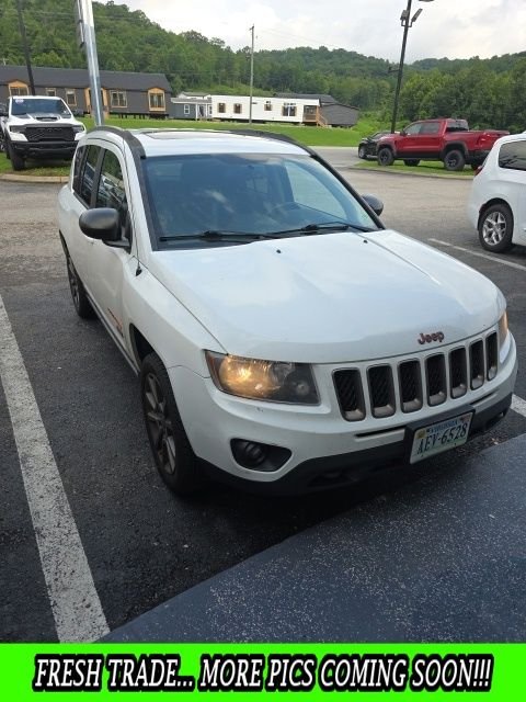 Used 2016 White Jeep Sport image 1
